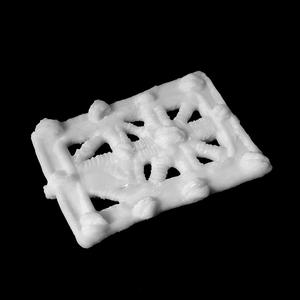 Gold-weight in the form of concave open-work shield at The British Museum, London