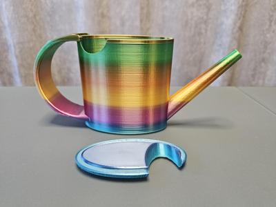 Small watering can with upper hole