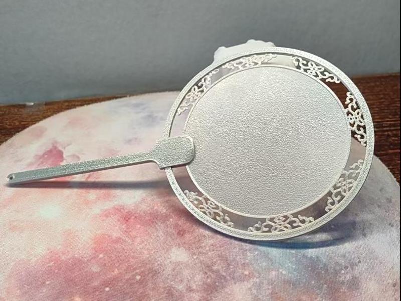 Detailed round fan with patterns