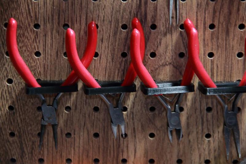 peg board pliers holder