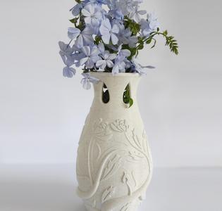 Vase with some leaves and branches