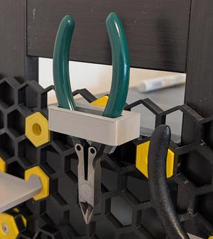 Honeycomb Storage Wall: Holder for a small tool (wire cutters, pliers etc)