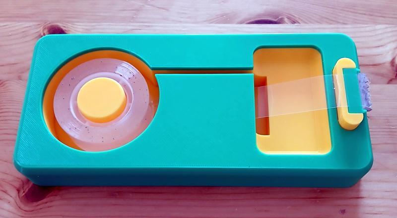 Horizontal Tape Dispenser with homemade blade.