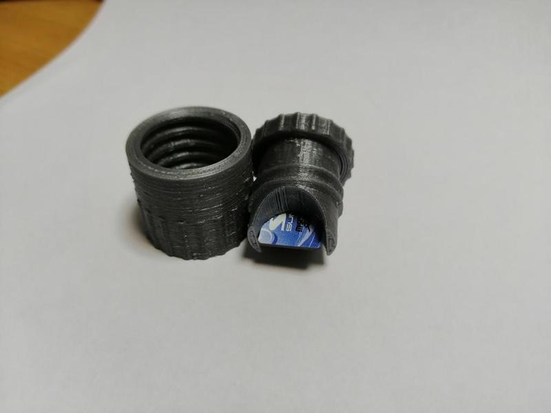 Micro SD card container or keyring.