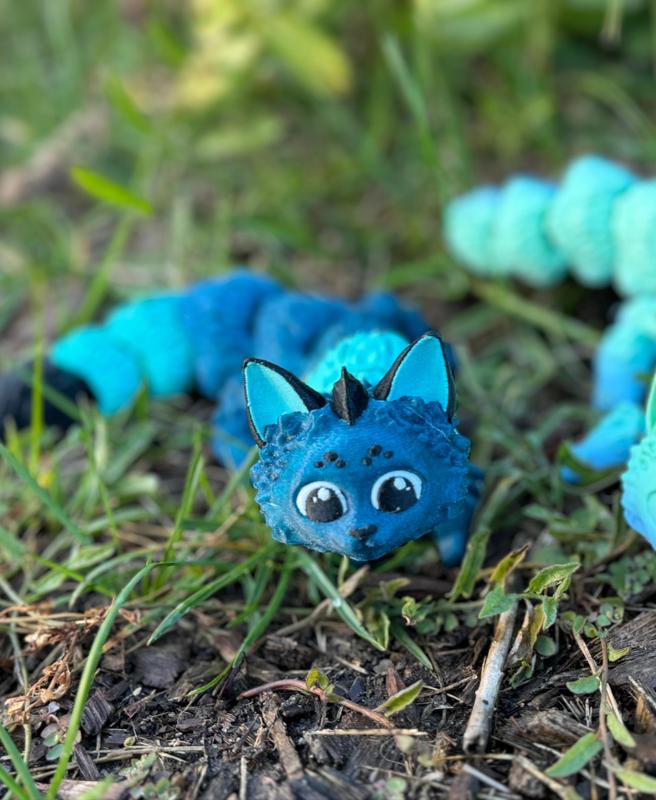 Tavi the articulated Teal Cat