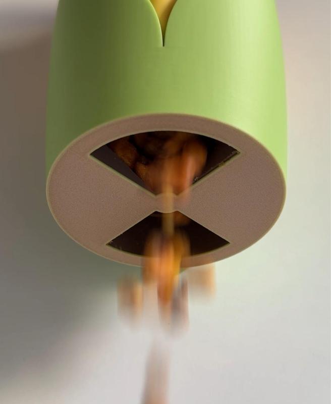 Maize, wall mounted snack dispenser.