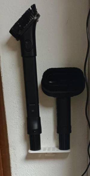 Nozzle holder for vacuum cleaner