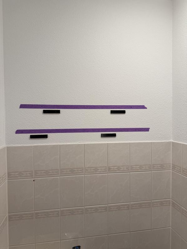 Slim removable wall mount for hanging pictures or mirrors with double sided tape