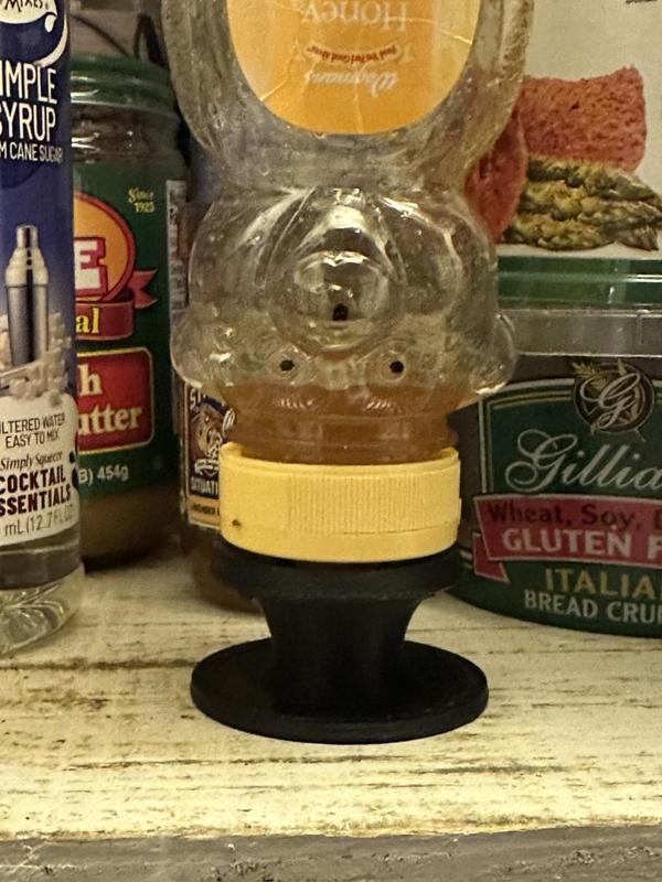Upside down honey bear bottle holder