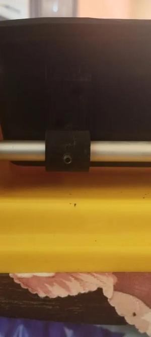 Clamp for mounting a bait hopper for a 10mm axle   