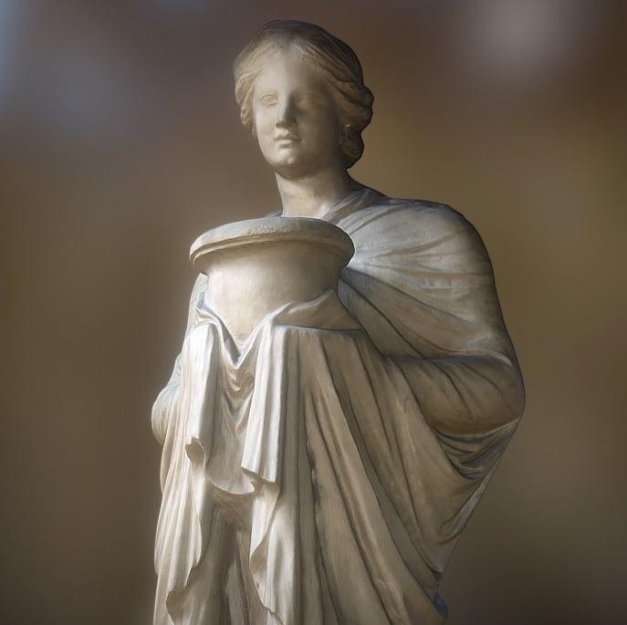 Standing Isis priest