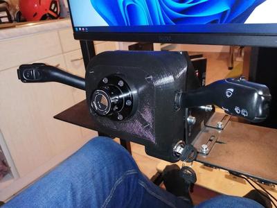  Octavia sticks under the steering wheel on Simagic Alpha Mini