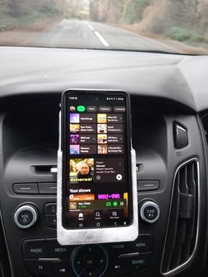 Vertical car phone holder CD insert