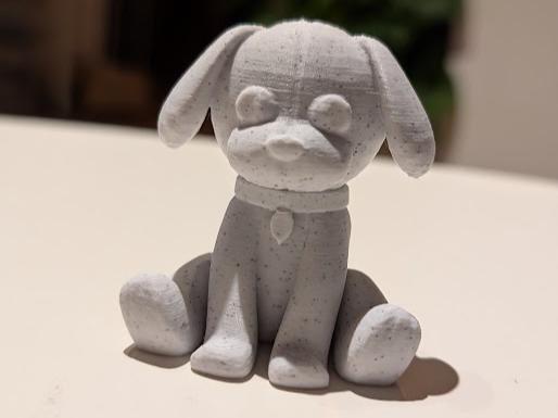 Stuffed toy sitting puppy