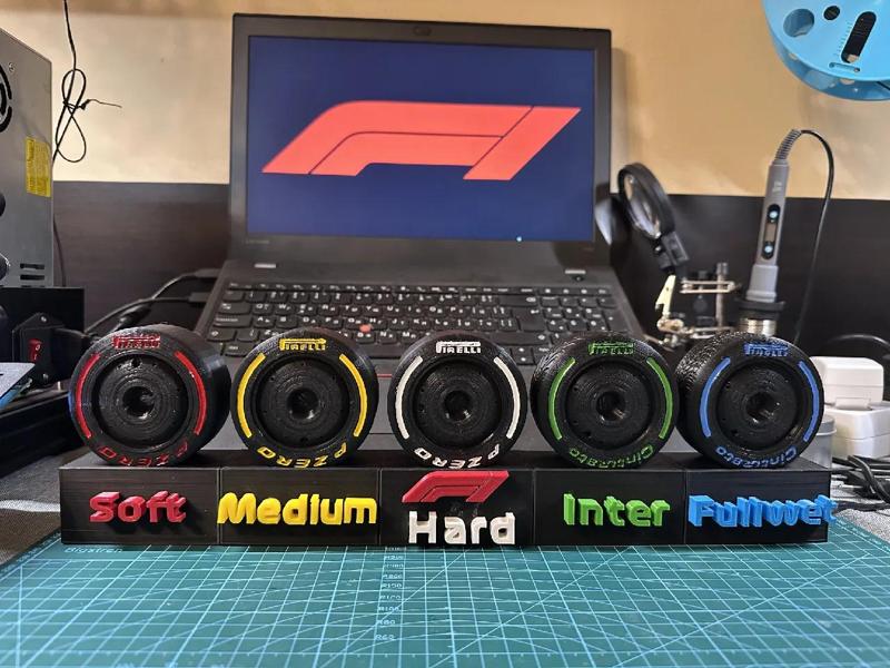 Pirelli F1 18 inch tires with a stand   