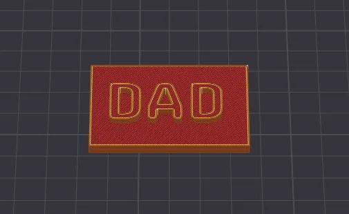 a desk plate that says dad   