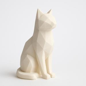 Geometric sculpture of a seated cat