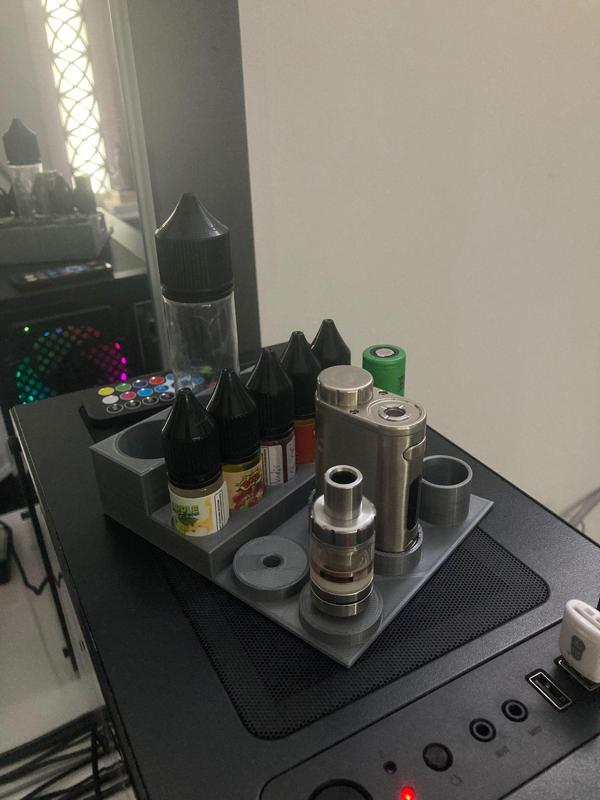 IStick Pico Melo 3 Mini (Vape) and 10ML and 60ML guerilla liquid stand