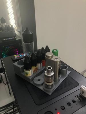 IStick Pico Melo 3 Mini (Vape) and 10ML and 60ML guerilla liquid stand