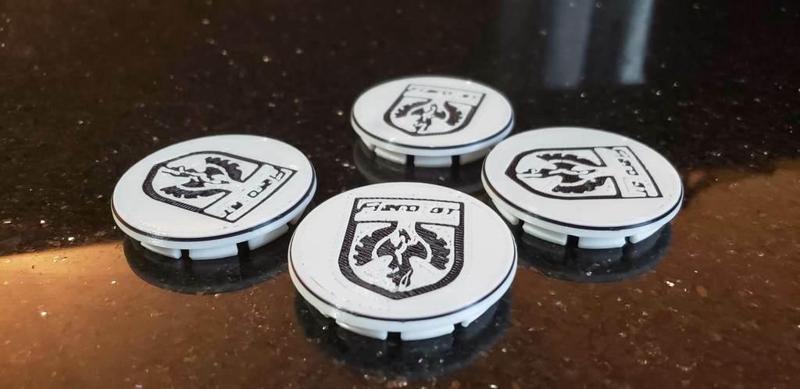 Pontiac Fiero wheel center cap with emblem