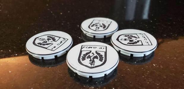 Pontiac Fiero wheel center cap with emblem