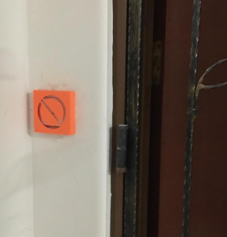 Not-working signage cover for door bell or electrical switch