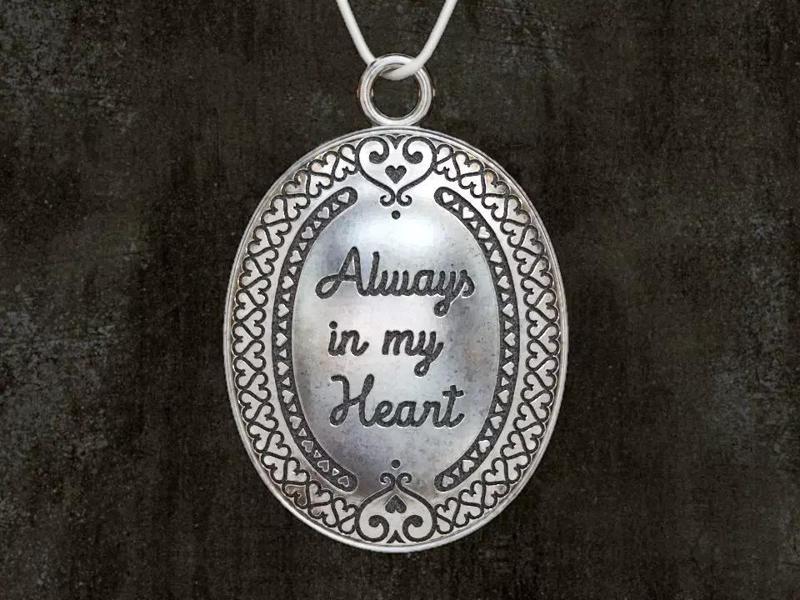 Oval locket for two photos