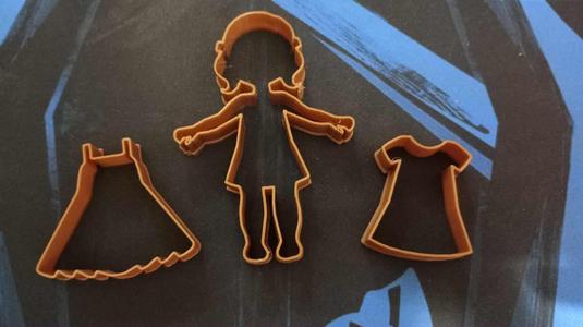 cookie cutter doll with dresses