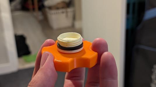 Wavian water jug thumbwheel
