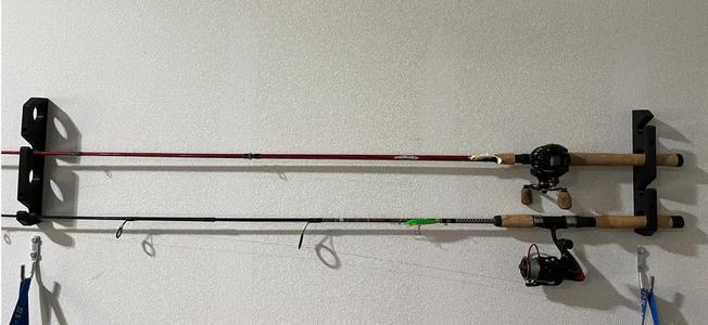 Wall-mounted fishing rod holder   