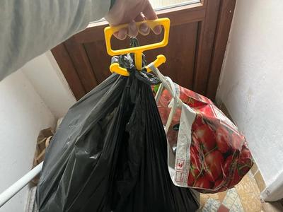 Holder, carrier for plastic bags or trash bag   