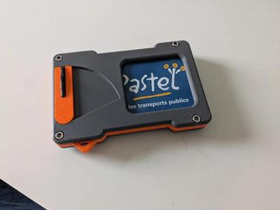 Pop-up credit card wallet spreader with coin/cash storage   