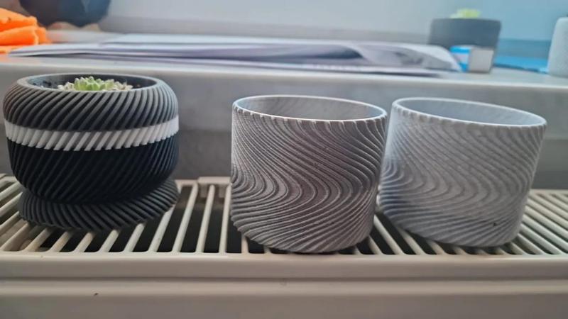 plant bots with included water draining system   