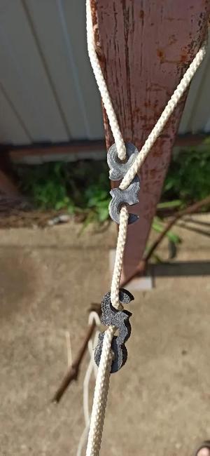 Paracord cord fastener and tensioner.   