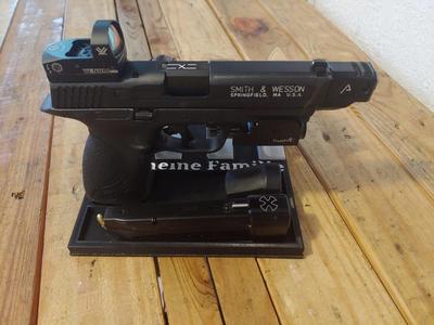 9mm pistol/ watch stand