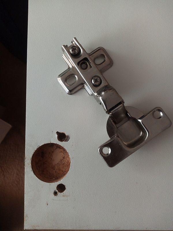 Kitchen cupboard door hinge fixer