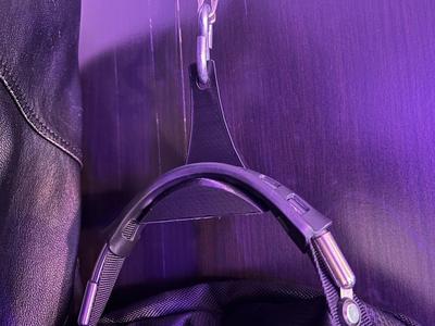 Backpack hanger with hole for hook