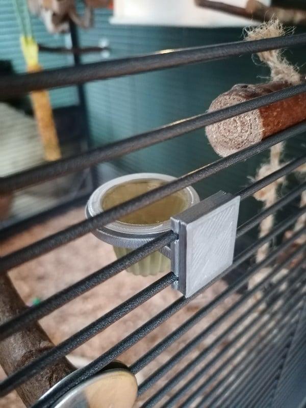 Fruitcup holder for my cockatiel.