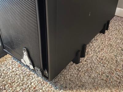 PC tower legs. Elevated for airflow.