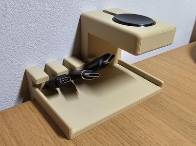 Desk cable organizer, wireless charger. 