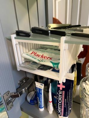 Bathroom cabinet under shelf extra storage