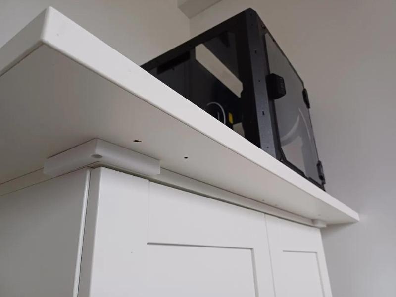 Cabinet Corner to fix a wooden plate on top of a cabinet with screws.   