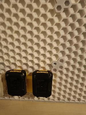 HSW: DeWalt 12v x2 battery wall holder for honeycomb storage wall.   