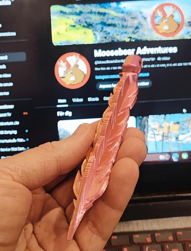 Backpacking feather shaped tent peg