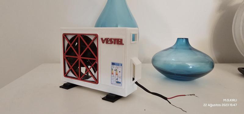 Mini fan in the form of air conditioner