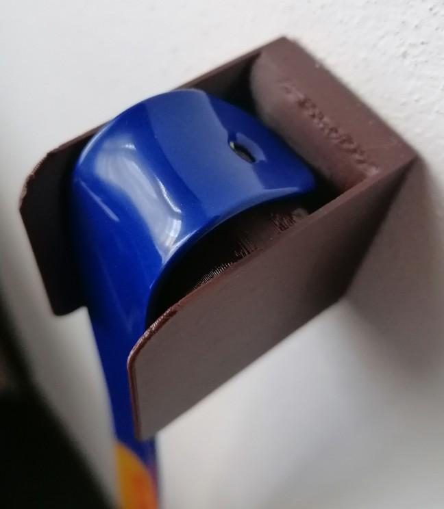 Držák lžíce na boty