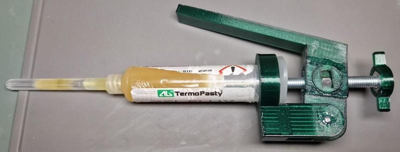 Wyciskacz topnika (flux dispenser)