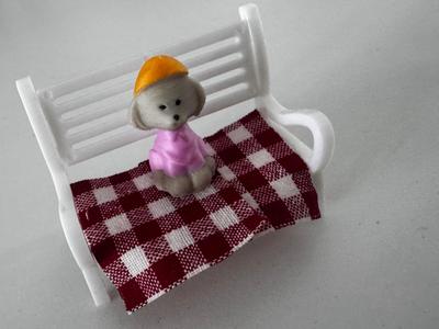 Cute dog sitting on bench