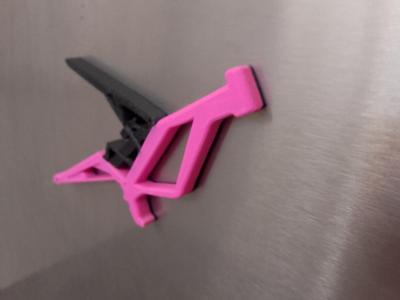 Surron, magnet/keychain