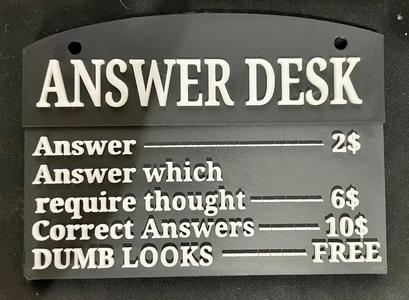 Answer Desk sign in black and white